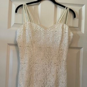 Gently worn beaded and lace wedding dress. Size 8/10